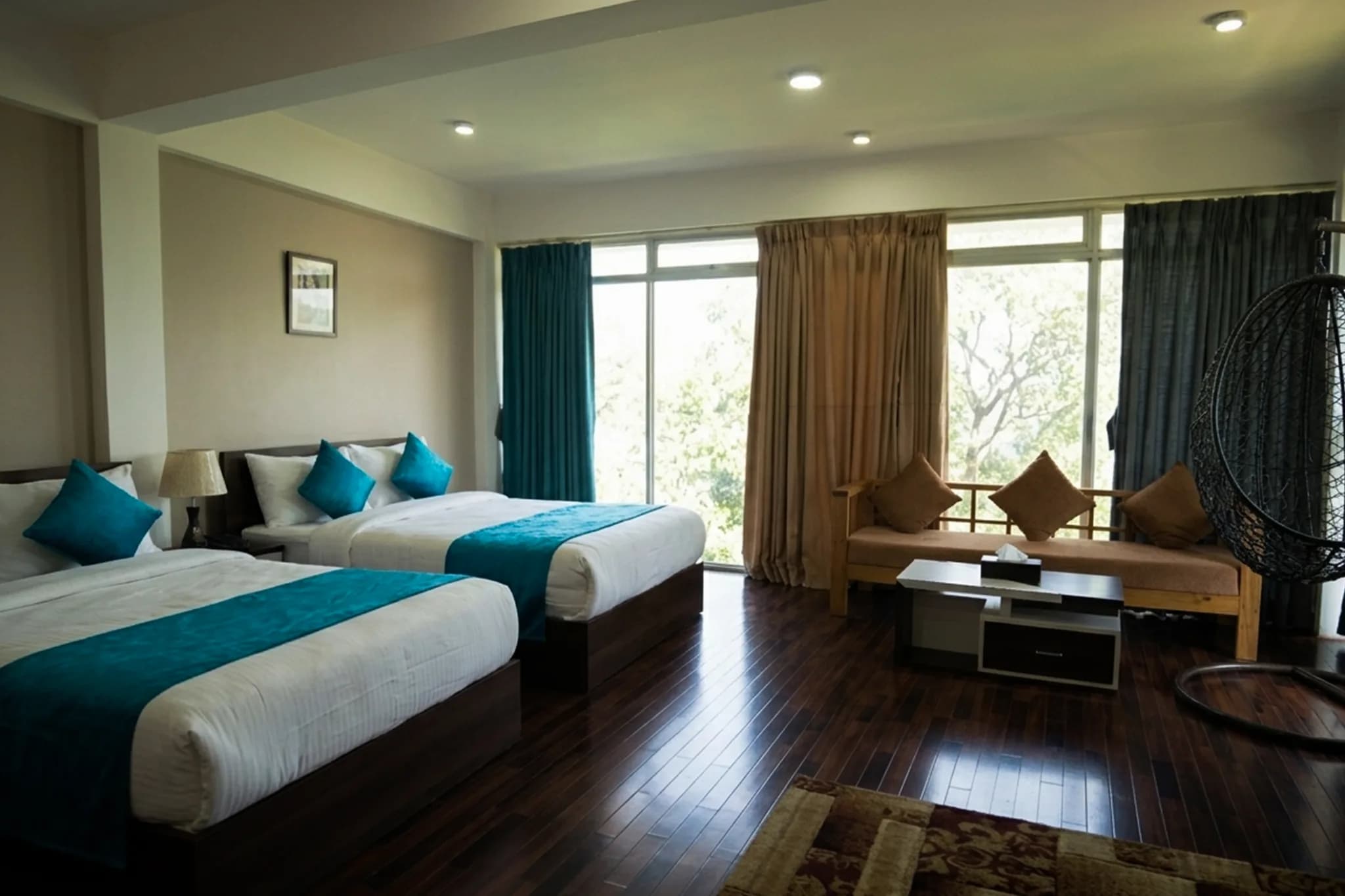 Luxury meets comfort—relax in style with spacious bedding, floor-to-ceiling views, and your own cozy swing chair.
